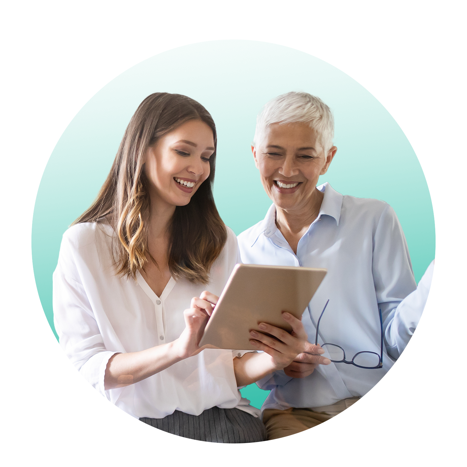 Two HR employees looking at performance management software on tablet.