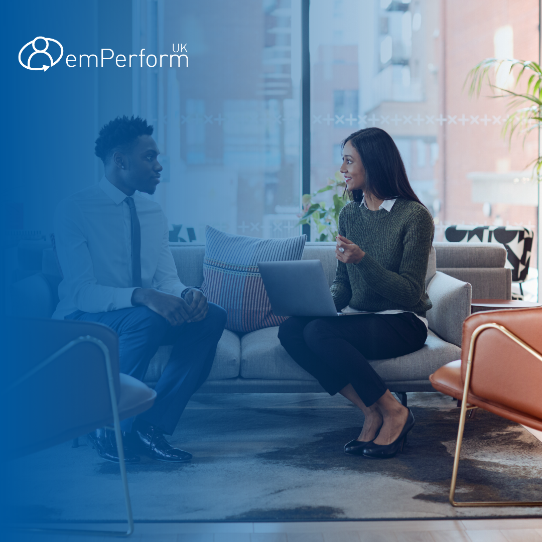 employee engagement - a manager and employee meet in an office